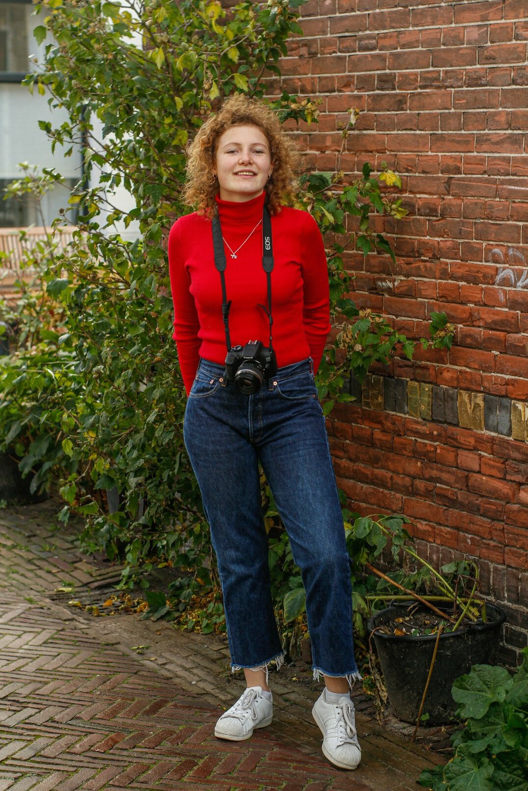 Portrait of a female photojournalist smiling