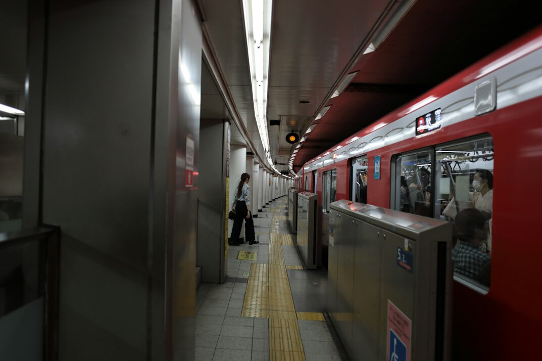 Passengers waiting on a subway platform